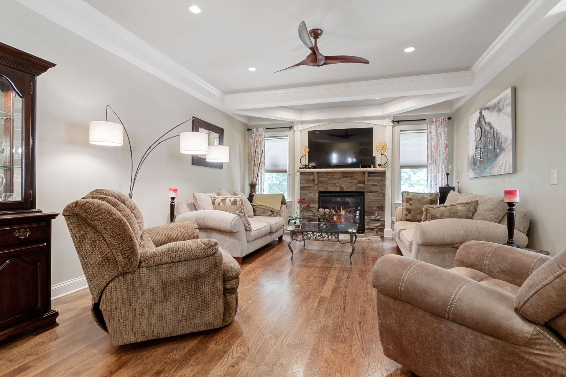 Bright remodeled family living room with fireplace in Ogden, Utah