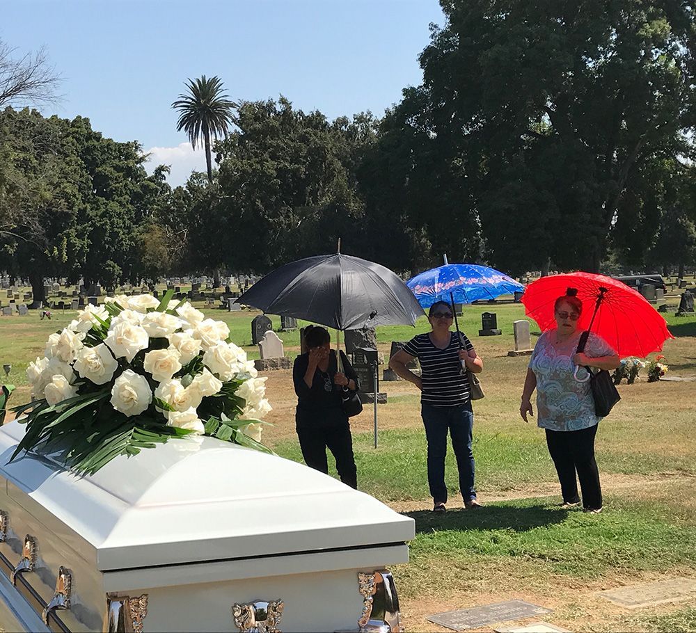 Family at graveside Chavez Funeral & Cremation Services, Inc. CA