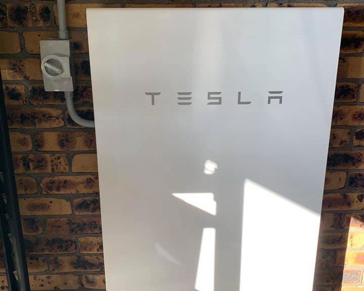Tesla Powerwall Mounted To A Wall — High-Quality Solar Panels in Gunnedah
