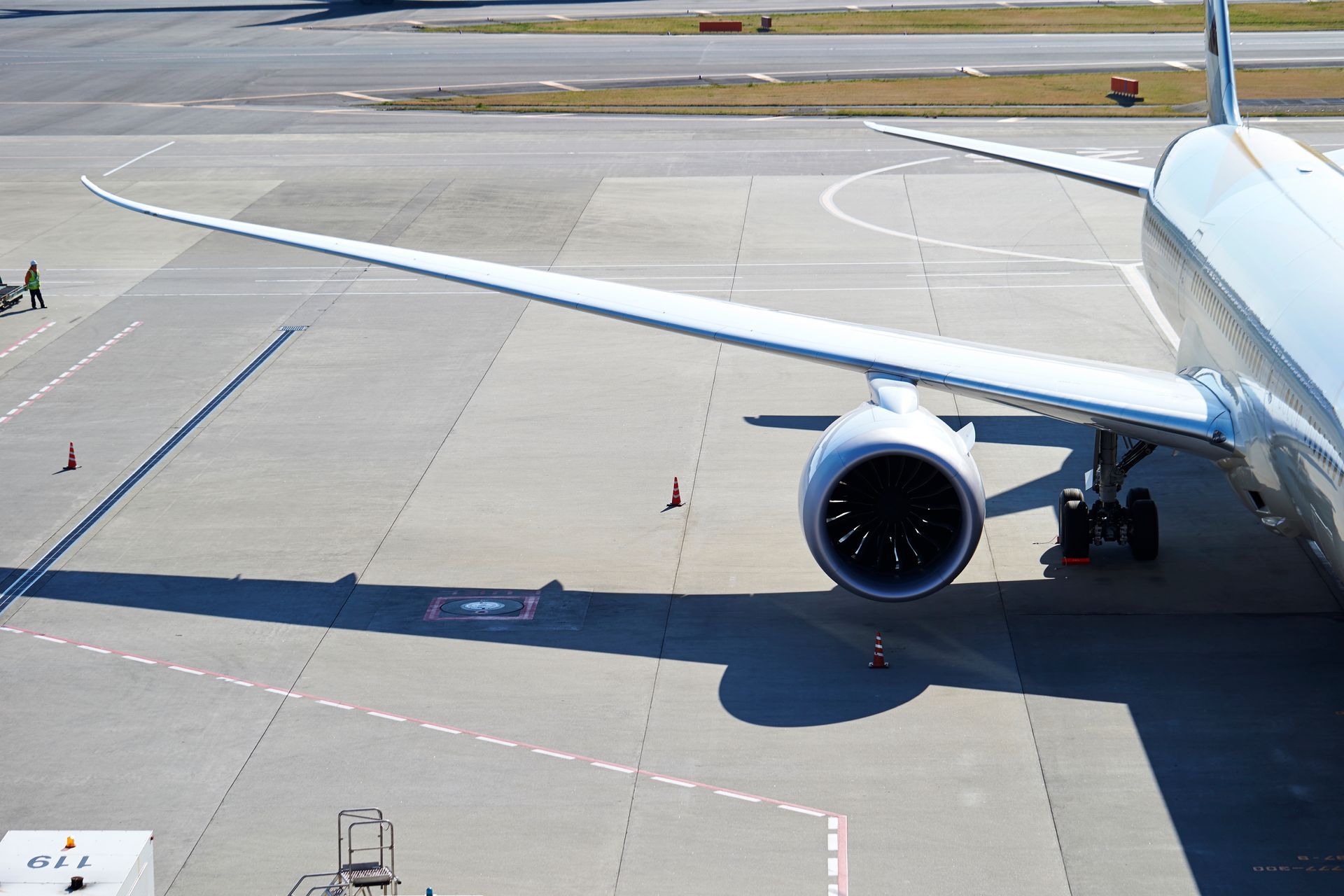 Airplane wing on airport tarmac