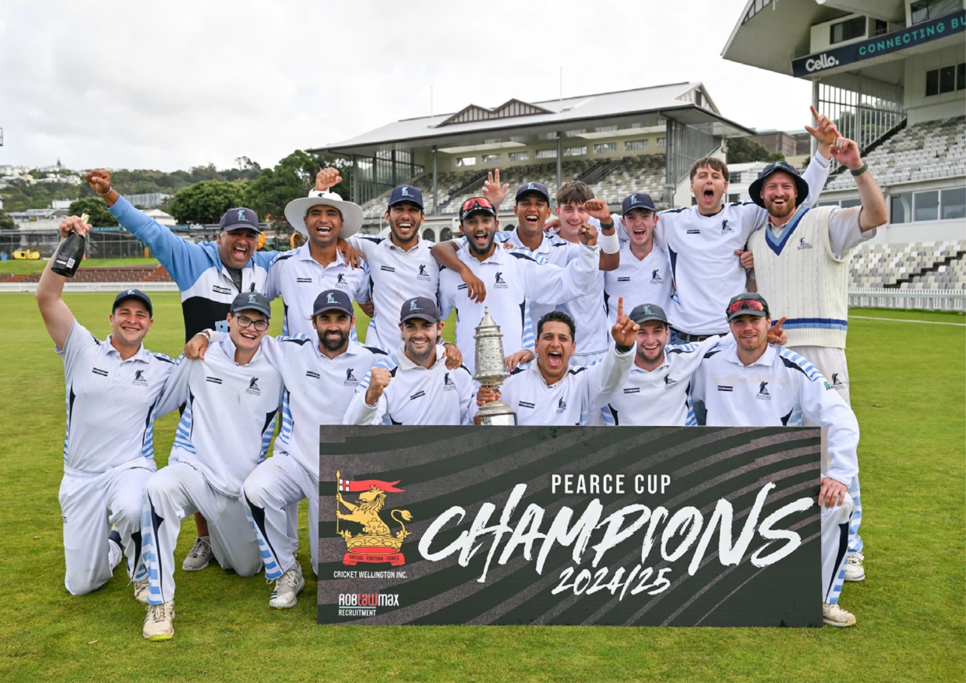 Cricket team celebrating championship win sponsored by RobLawMax Recruitment