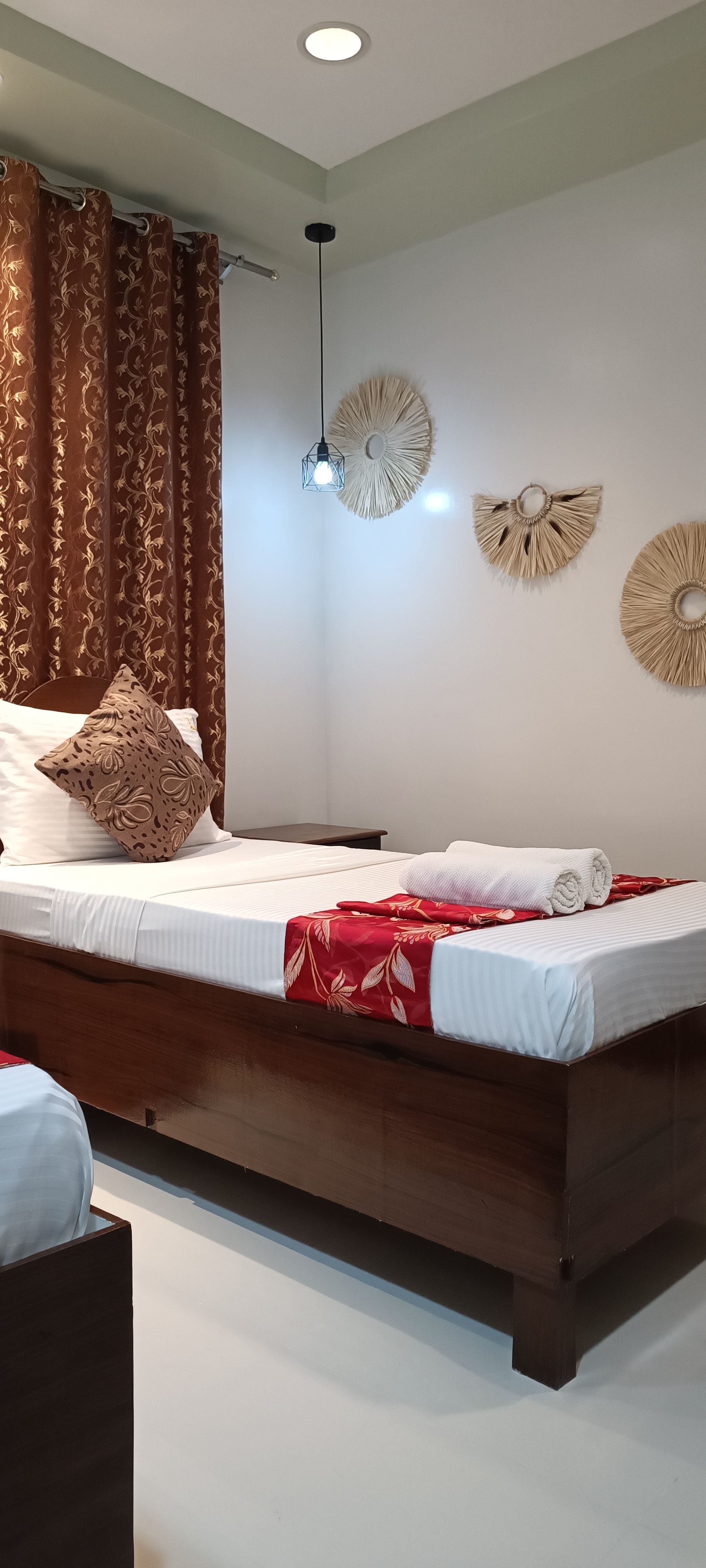 There is a bed in the middle of the room.