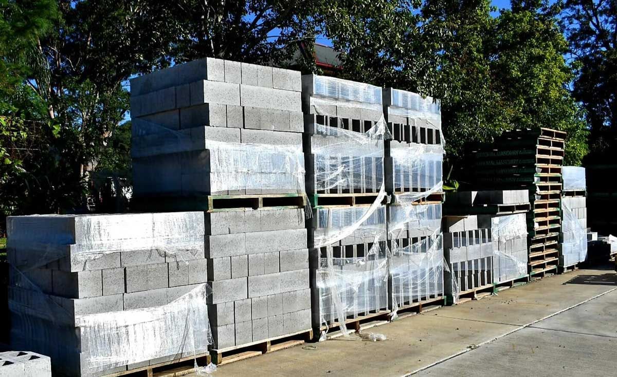 A Row of Concrete Blocks Stacked on Top of Each Other on Pallets — Budget Timbers in Yamba, NSW