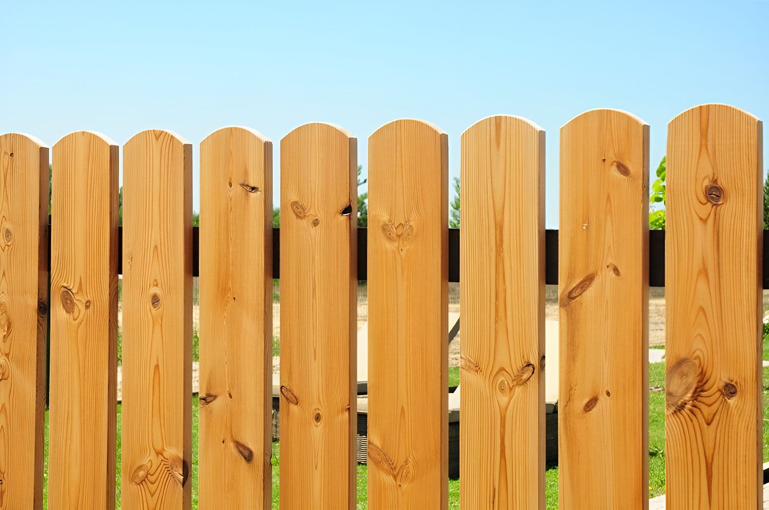 Timber Fence With Arched Tops