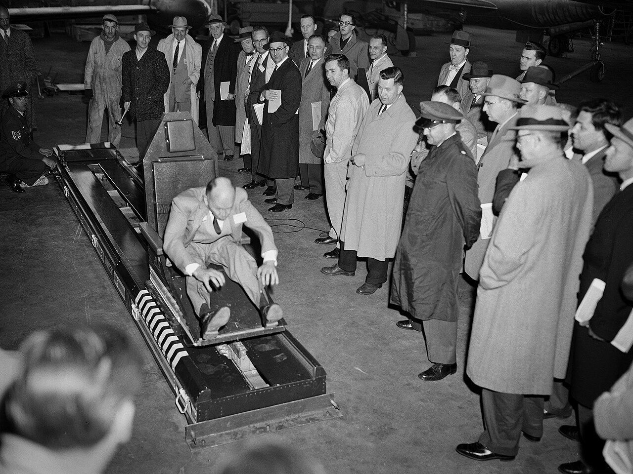 Colonel John Stapp demonstrating the rocket sled used in his G-force deceleration tests