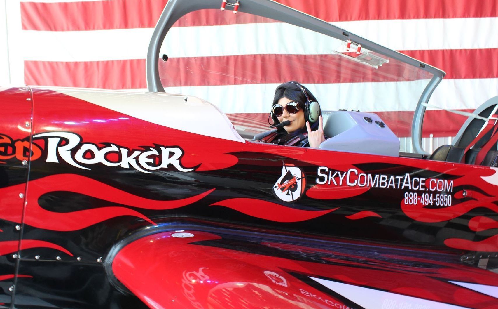 A red and black plane with the word rocker on it