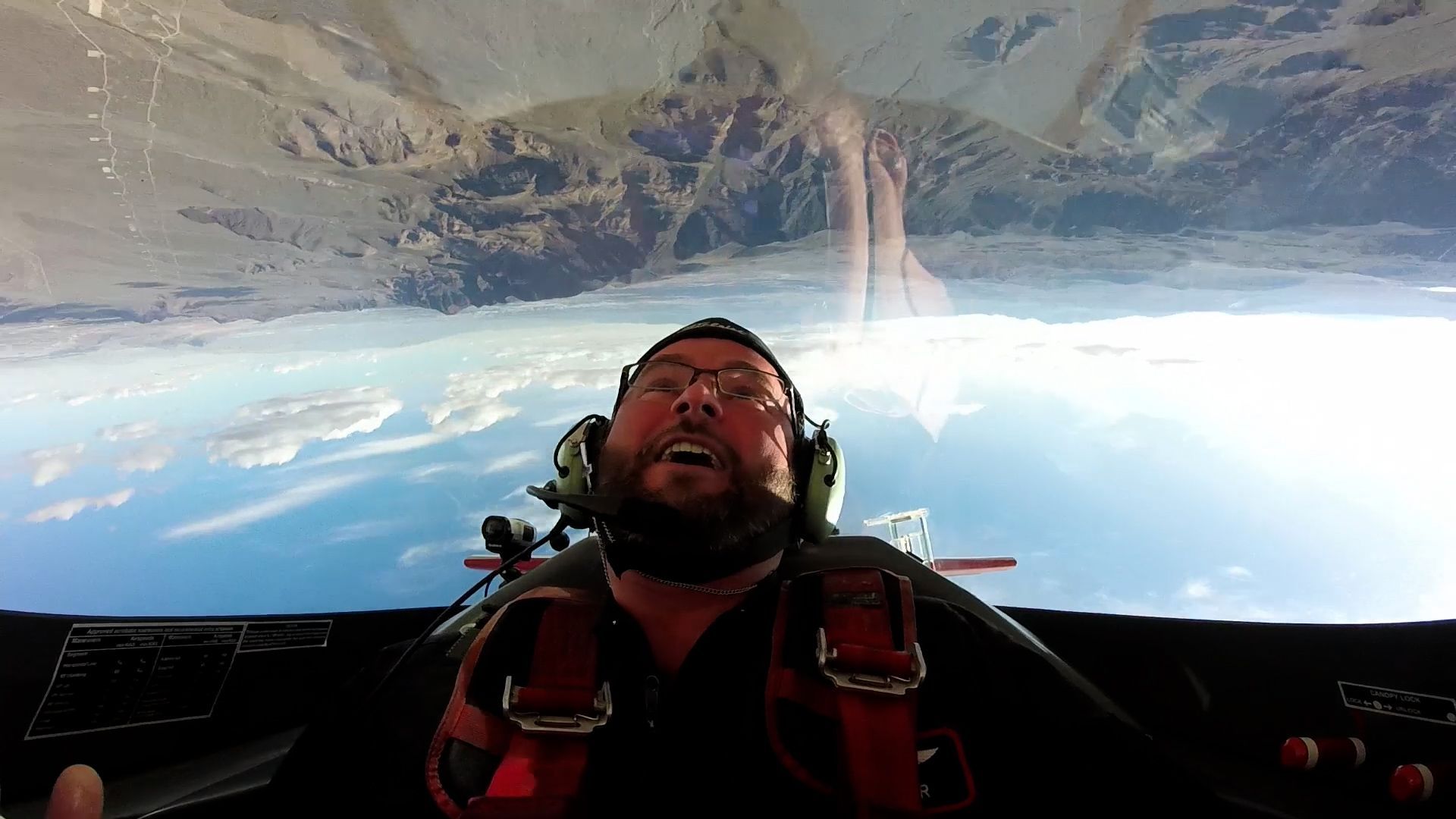 Man flying a Sky Combat Ace Plane