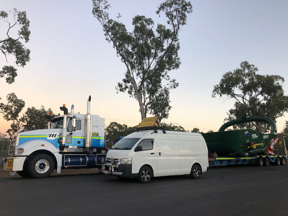 Van Escorting the Semi Truck — Col Adamson Transport Services in Farleigh, QLD