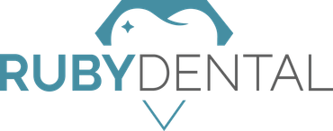 The logo for ruby dental shows a penguin and a tooth.