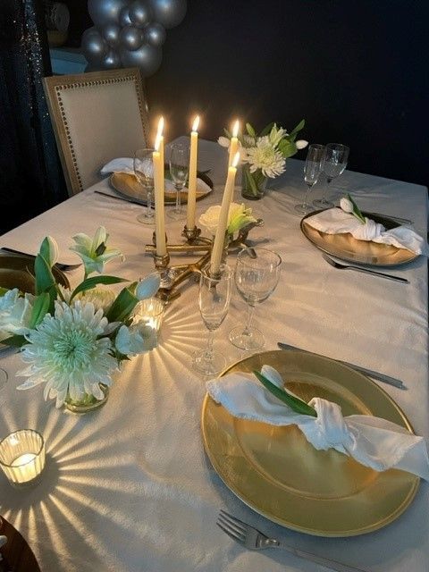 At home dinner party with a beautiful dining room table.