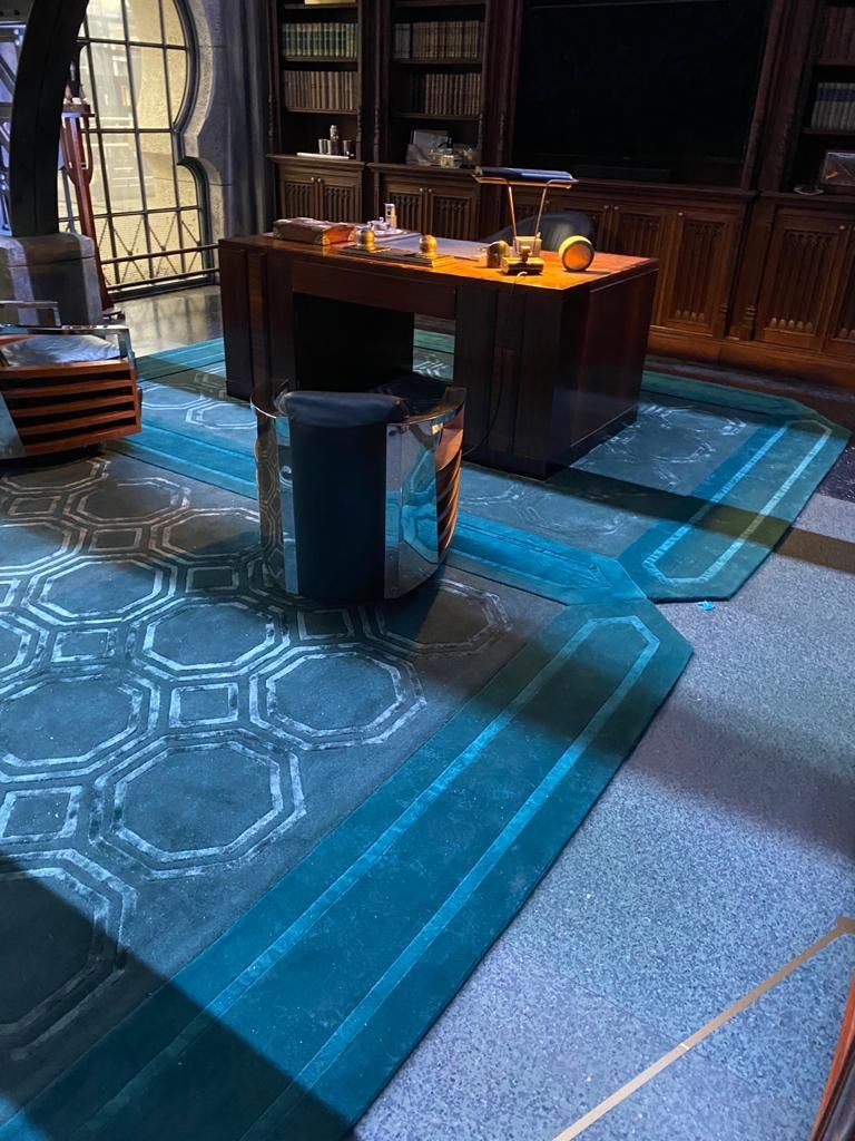 20's style blue rug. From the set of