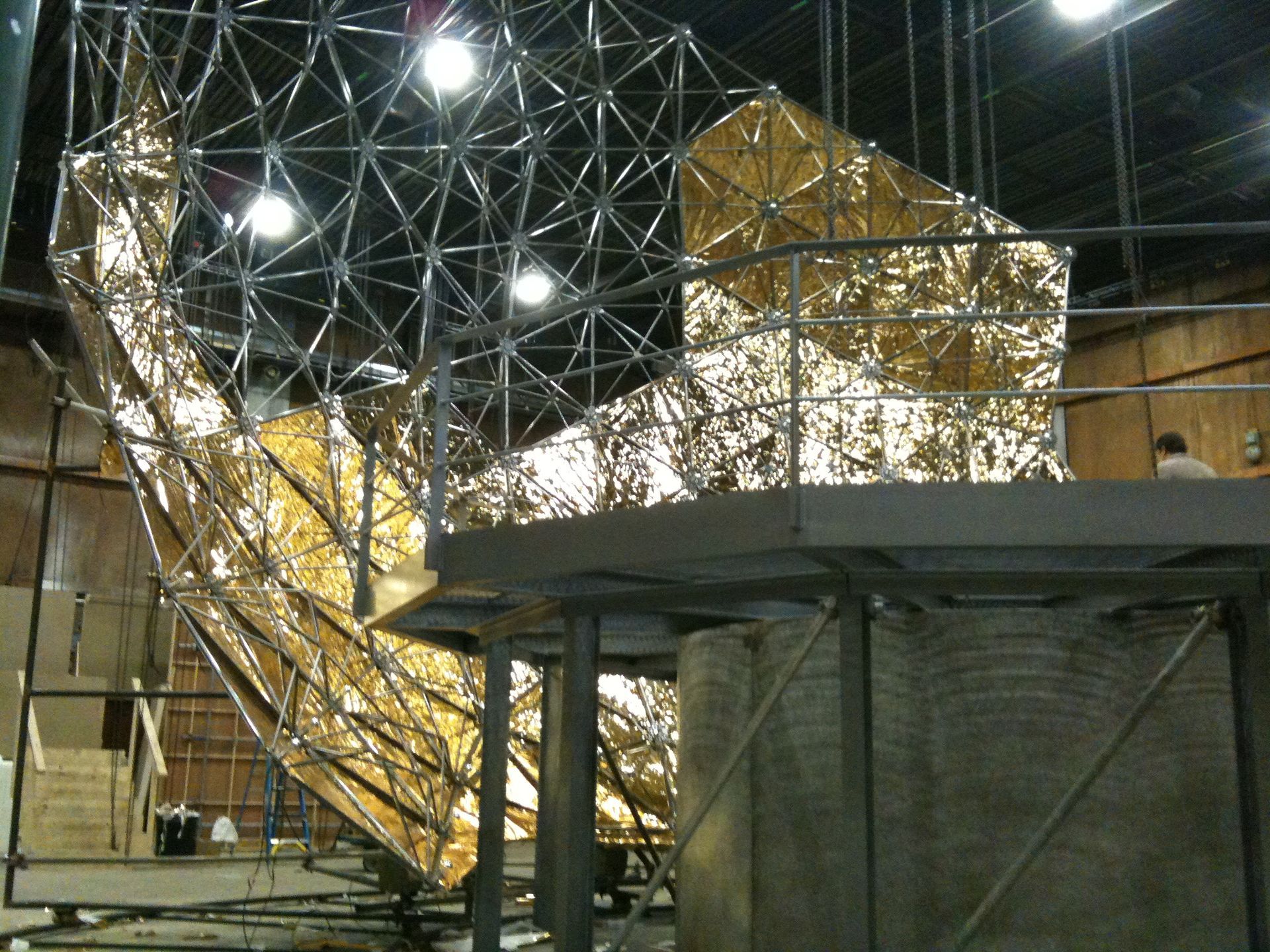 A gold paneled section of geodesic dome from
