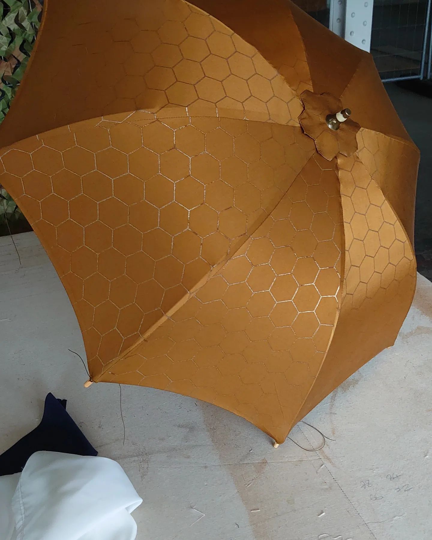 An umbrella with honeycomb pattern from