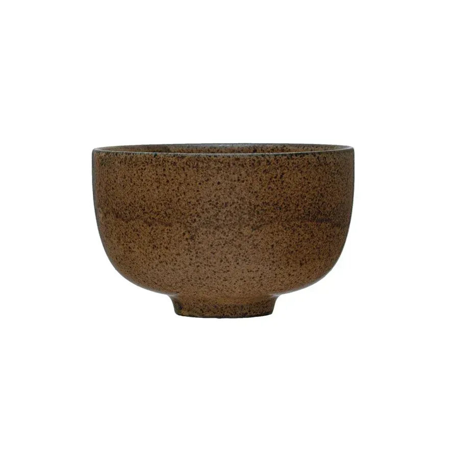 A small brown bowl on a white background.