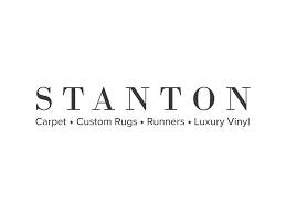 Stanton logo with tagline: Carpet, Custom Rugs, Runners, Luxury Vinyl