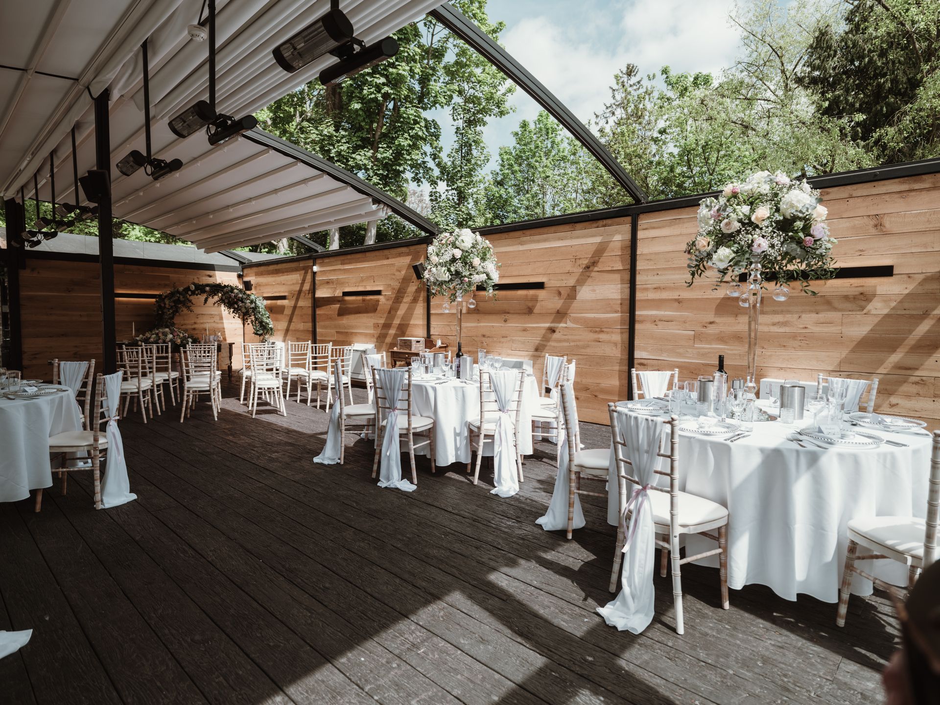 A petite wedding ceremony and wedding breakfast set up in the Glasshouse