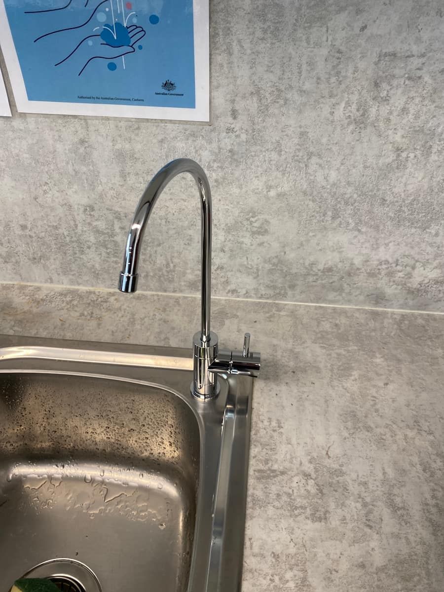 A Close Up Of A Kitchen Sink With A Faucet On It — Plumbmasters In Mermaid Waters, QLD