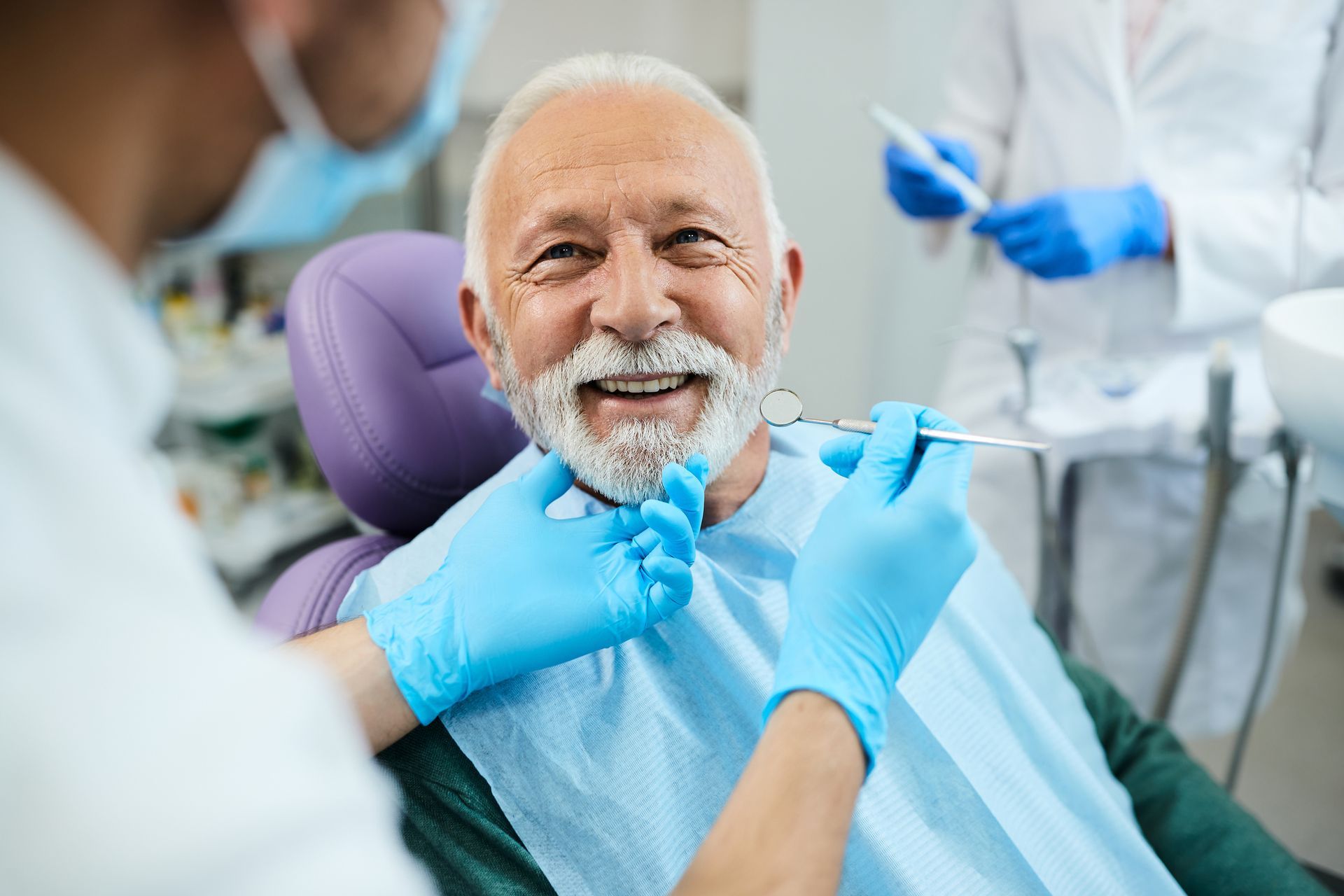 Old man getting a check up