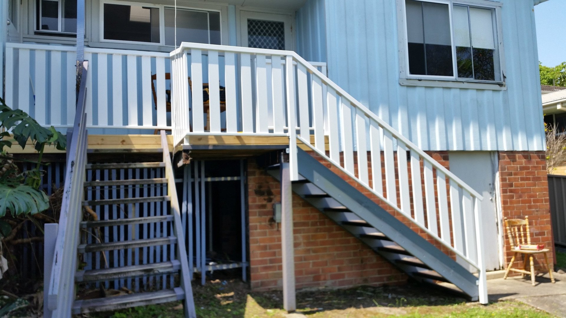 A House With Stairs Leading Up To The Second Floor — Boambee Home Improvements in Coffs Harbour, NSW