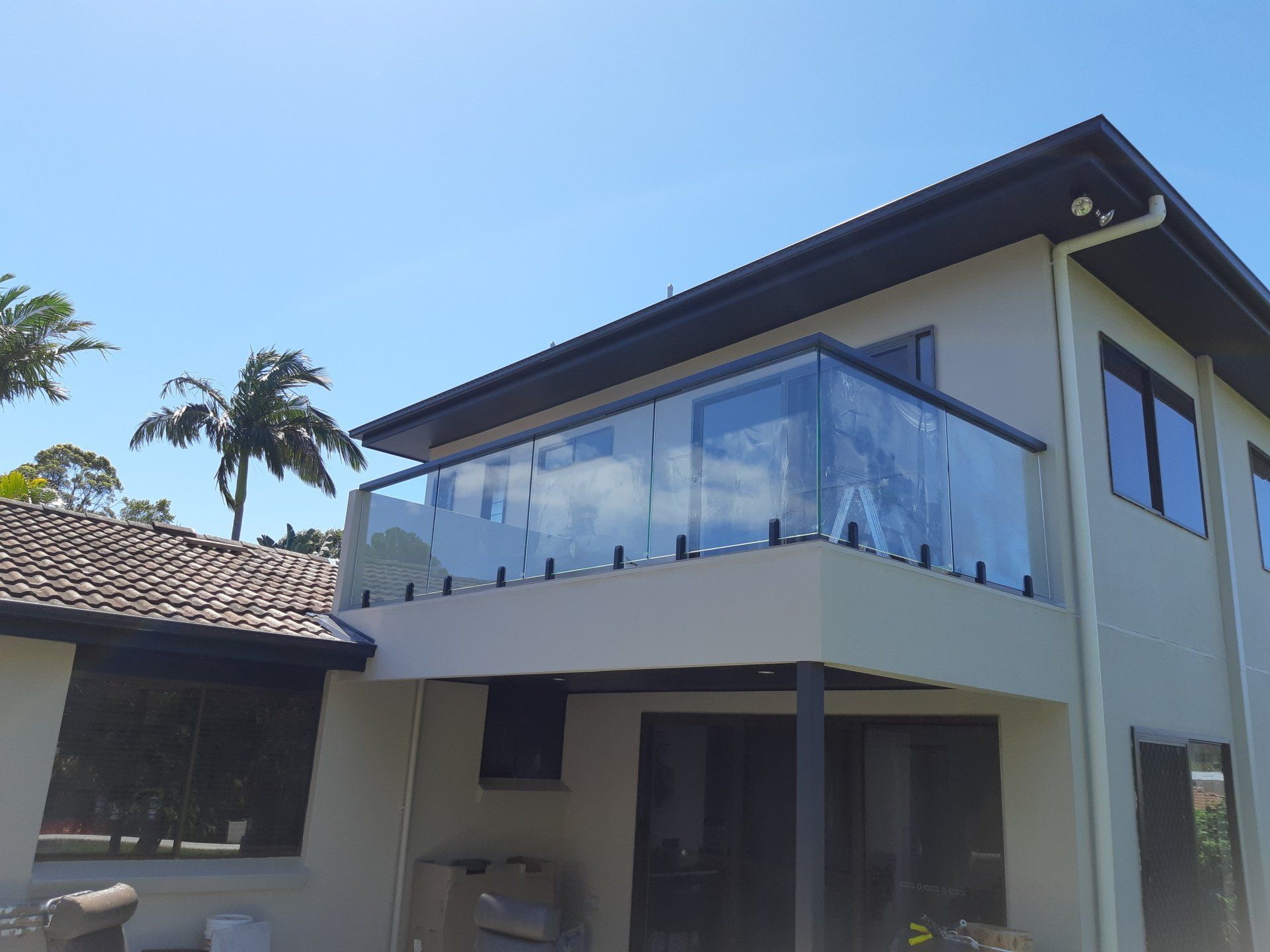 Glass balcony balustrade — Boambee Home Improvements in Coffs Harbour, NSW