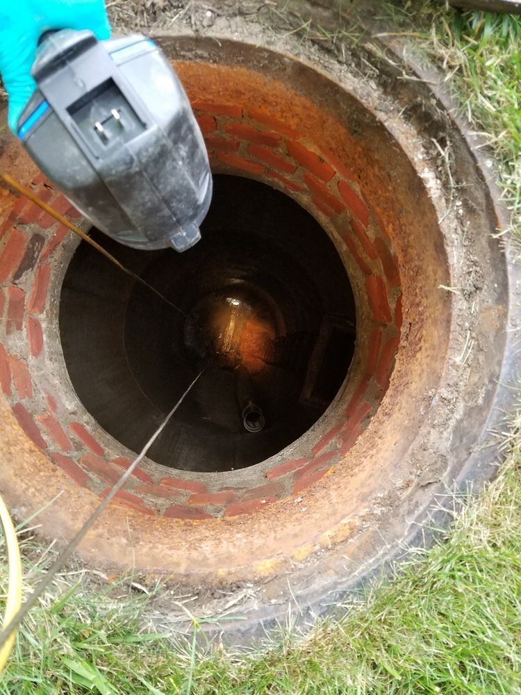 A Person is Looking Into a Manhole — KYK Industries in Katherine, NT