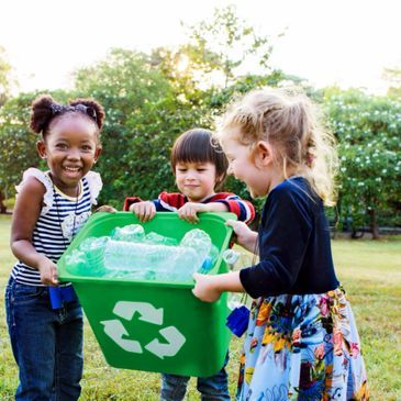 Kids collecting recyclable materials — Fairfax, VA — HEAVEN'S BEST MONTESSORI LLC Kids collecting recyclable materials — Fairfax, VA — HEAVEN'S BEST MONTESSORI LLC