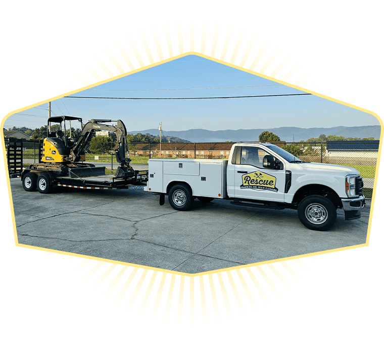 A white truck is towing a yellow excavator on a trailer.