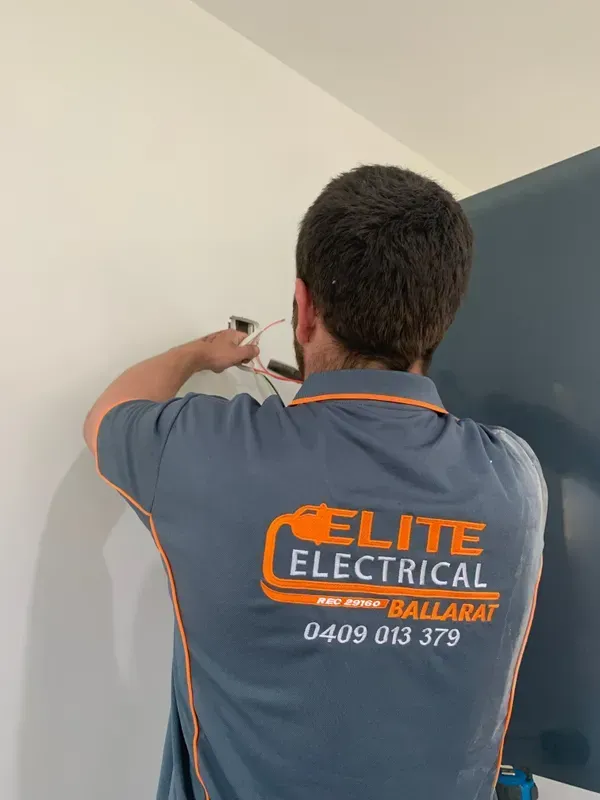 Worker Fixing The Wire — Elite Electrical Ballarat in Delacombe, VIC