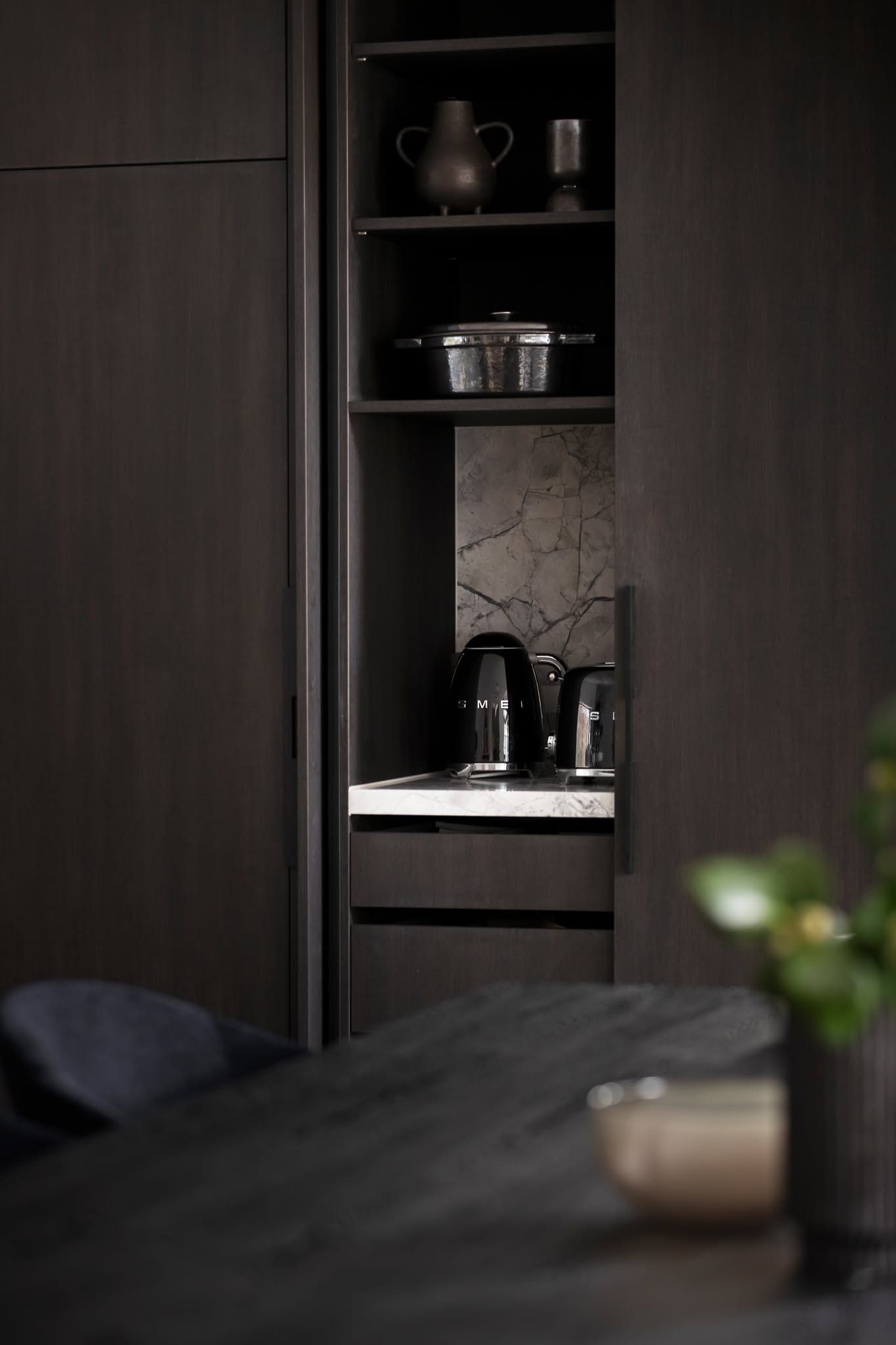 Modern Kitchen With Dark Cabinets and Open Shelves — Complete Property Projects in Phillip, ACT