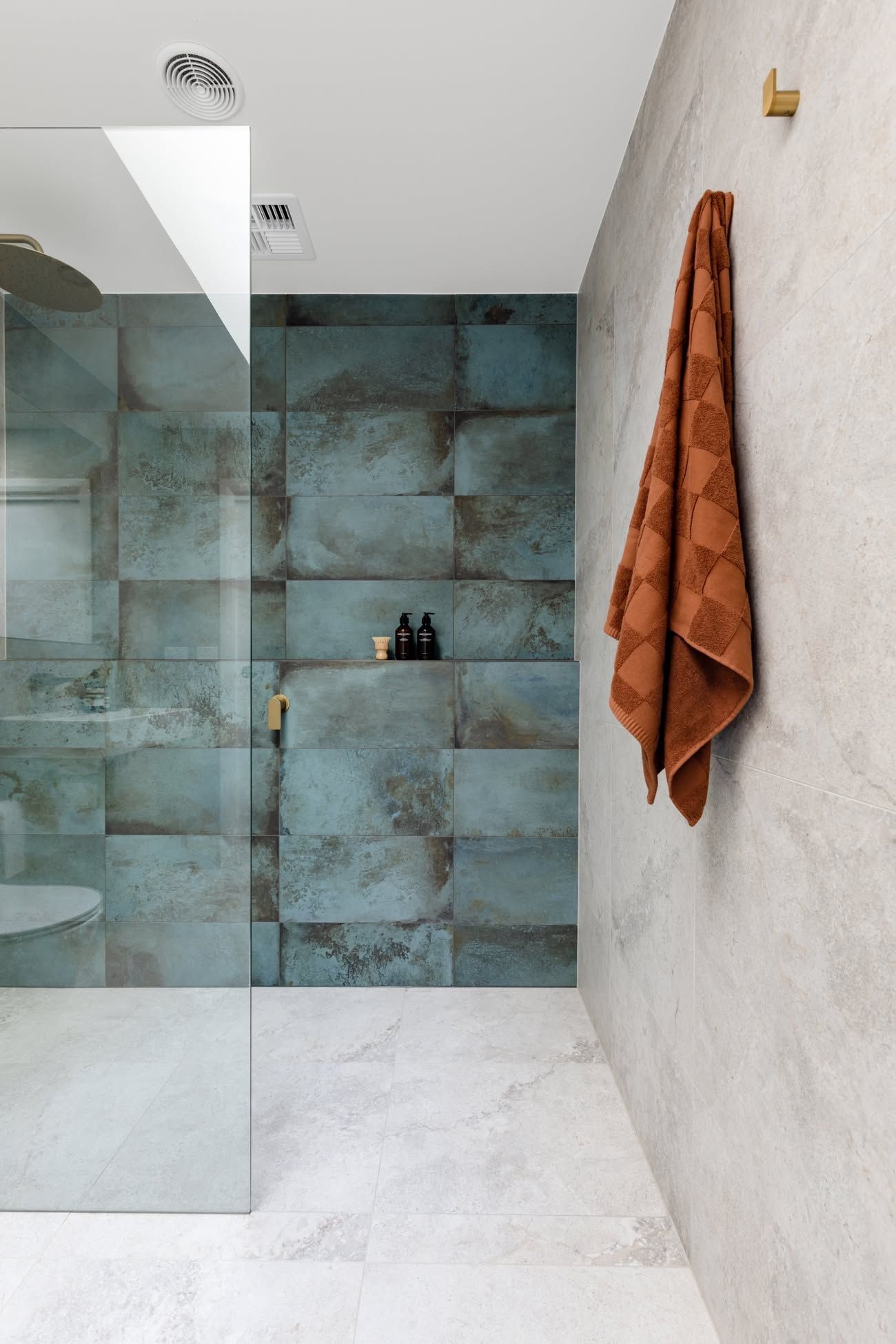Modern Shower with Blue Tiled Glass Enclosure — Complete Property Projects In Phillip, ACT