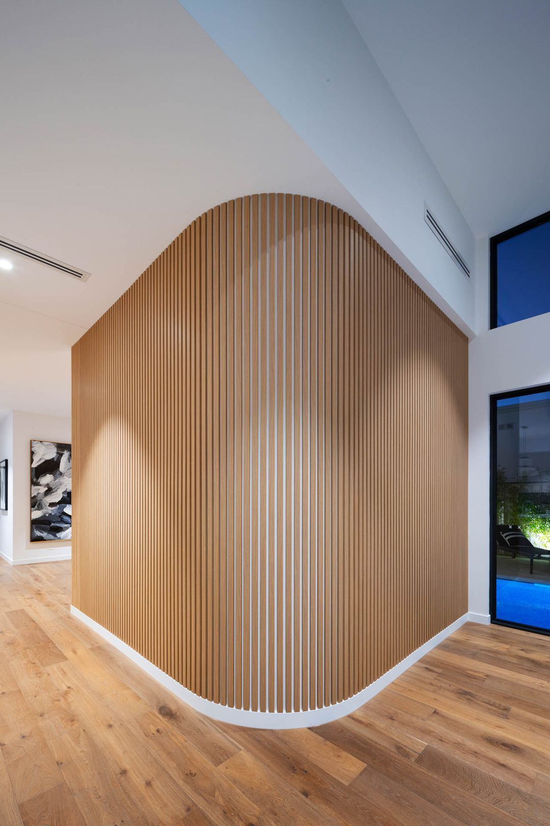 Modern Interior with Curved Vertical Wood Slat Wall — Complete Property Projects In Phillip, ACT