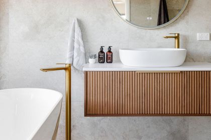 Modern Bathroom Vanity with Round Mirror — Complete Property Projects In Phillip, ACT