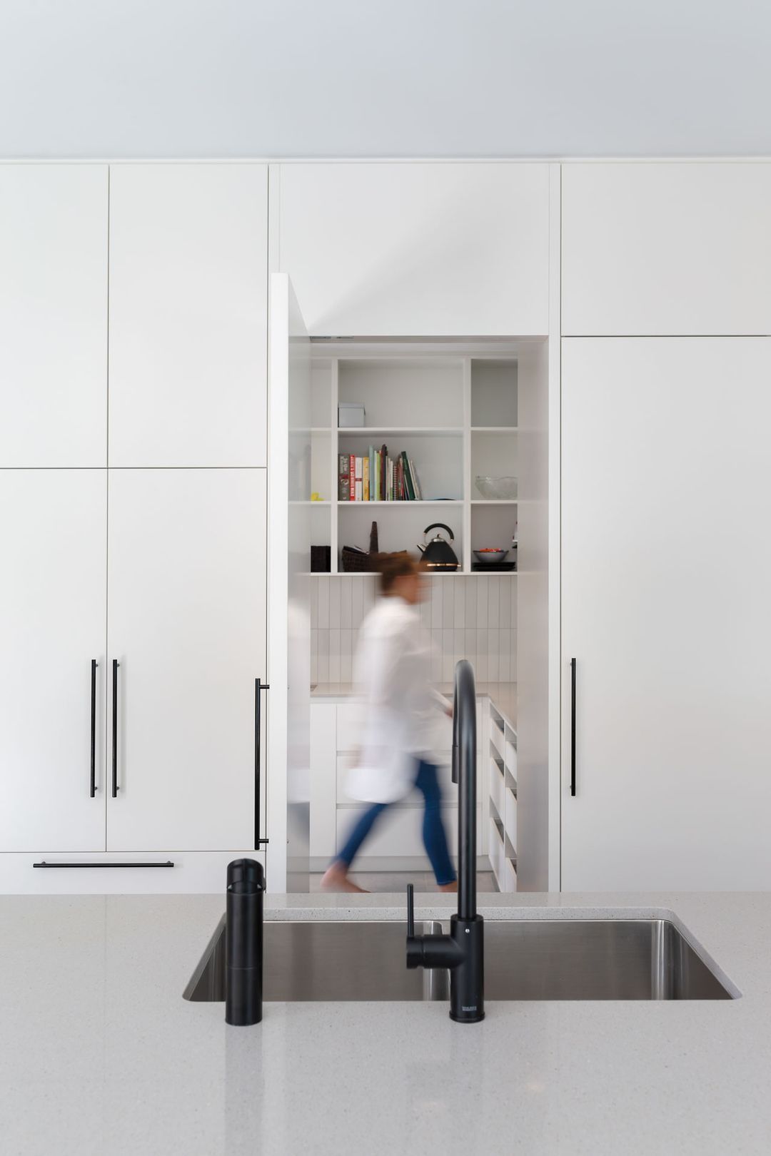 White Modern Kitchen with Sink in Foreground — Complete Property Projects In Phillip, ACT