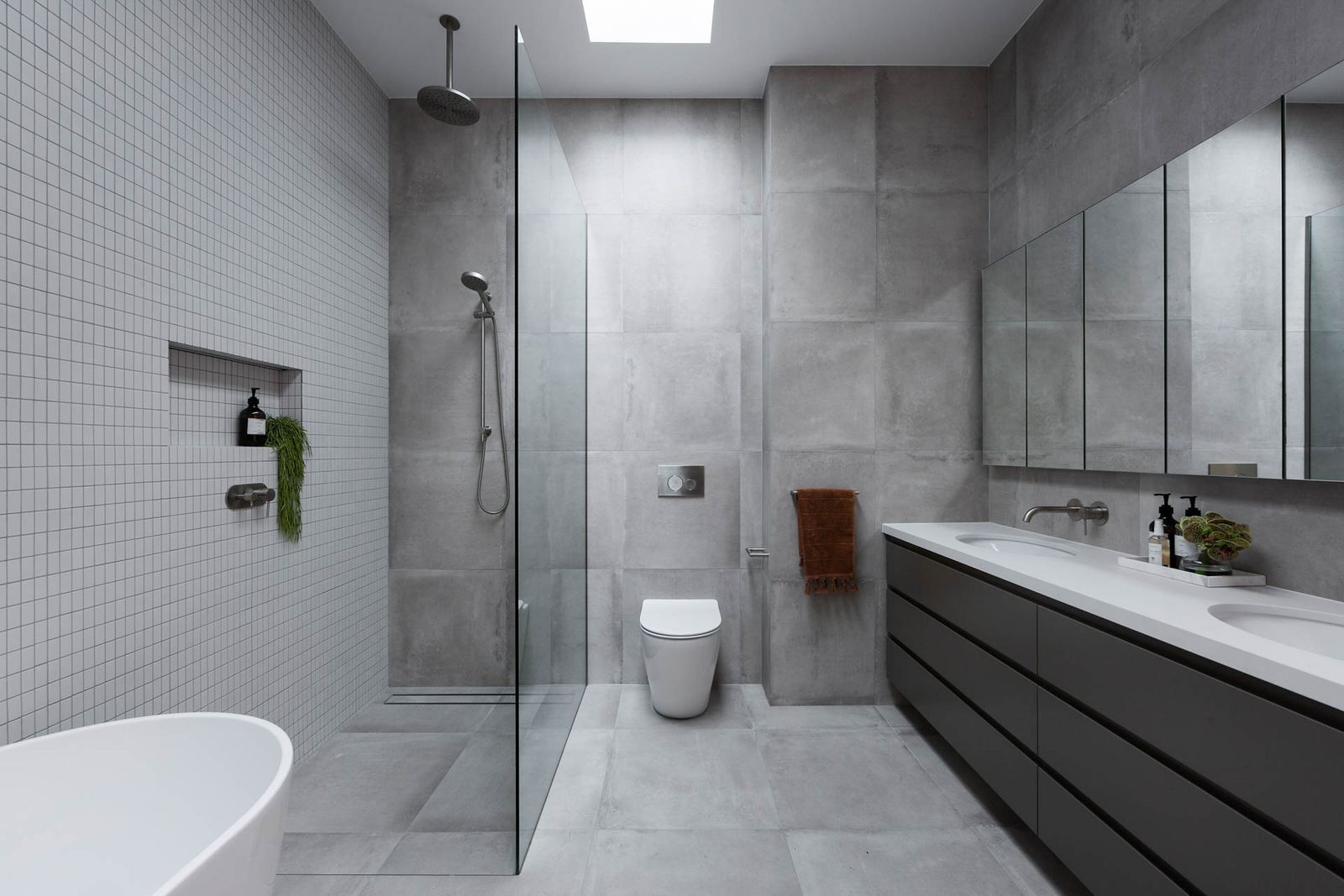 Modern Grey-Tiled Bathroom with Glass Shower — Complete Property Projects In Phillip, ACT