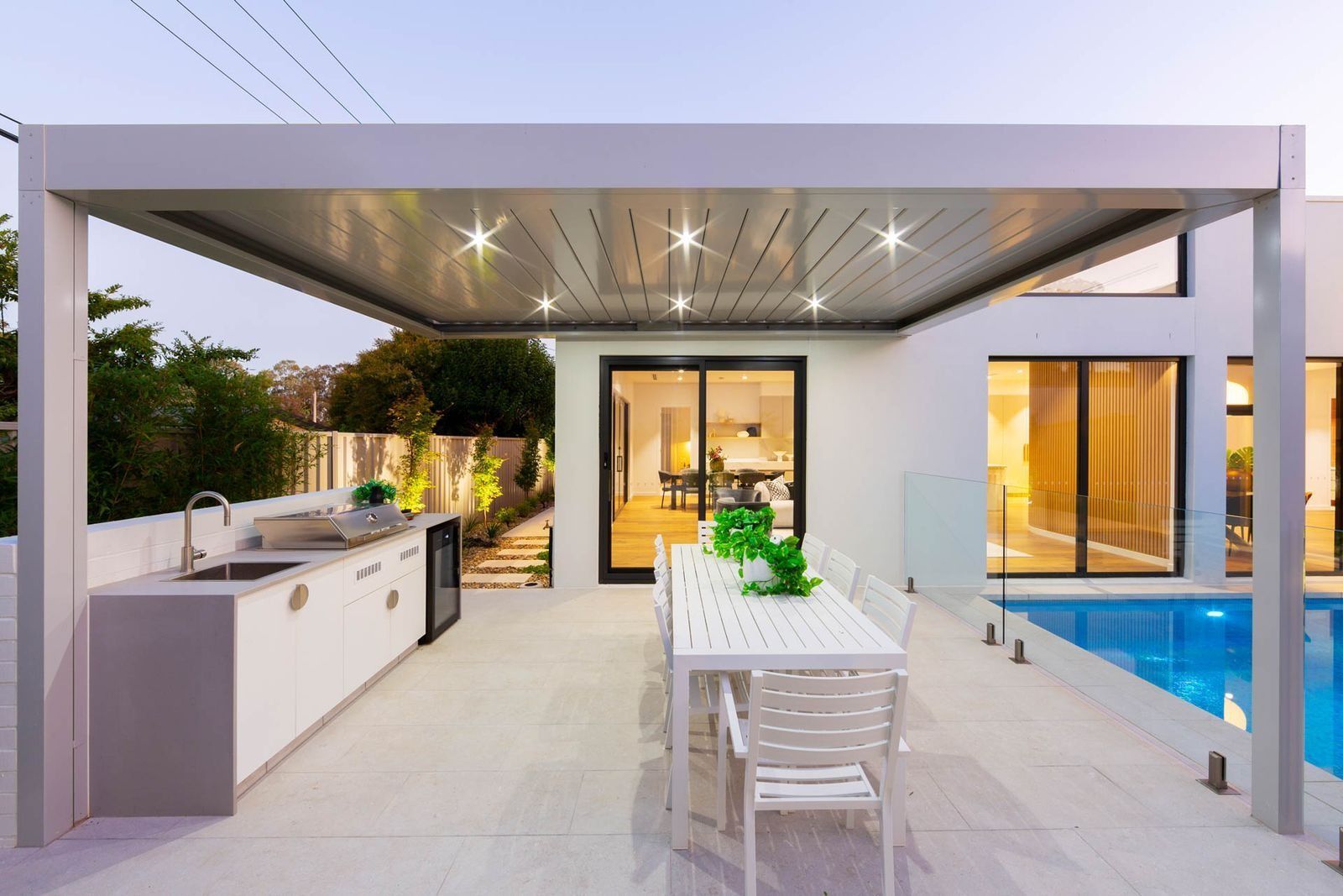 Modern Patio with Outdoor Kitchen, Dining Table — Complete Property Projects In Phillip, ACT