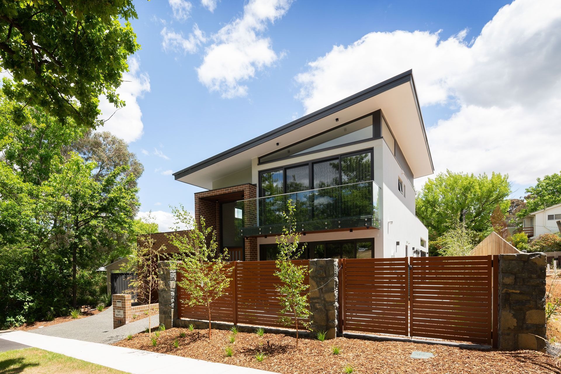 Modern Two-Story House with Large Windows — Complete Property Projects In Phillip, ACT