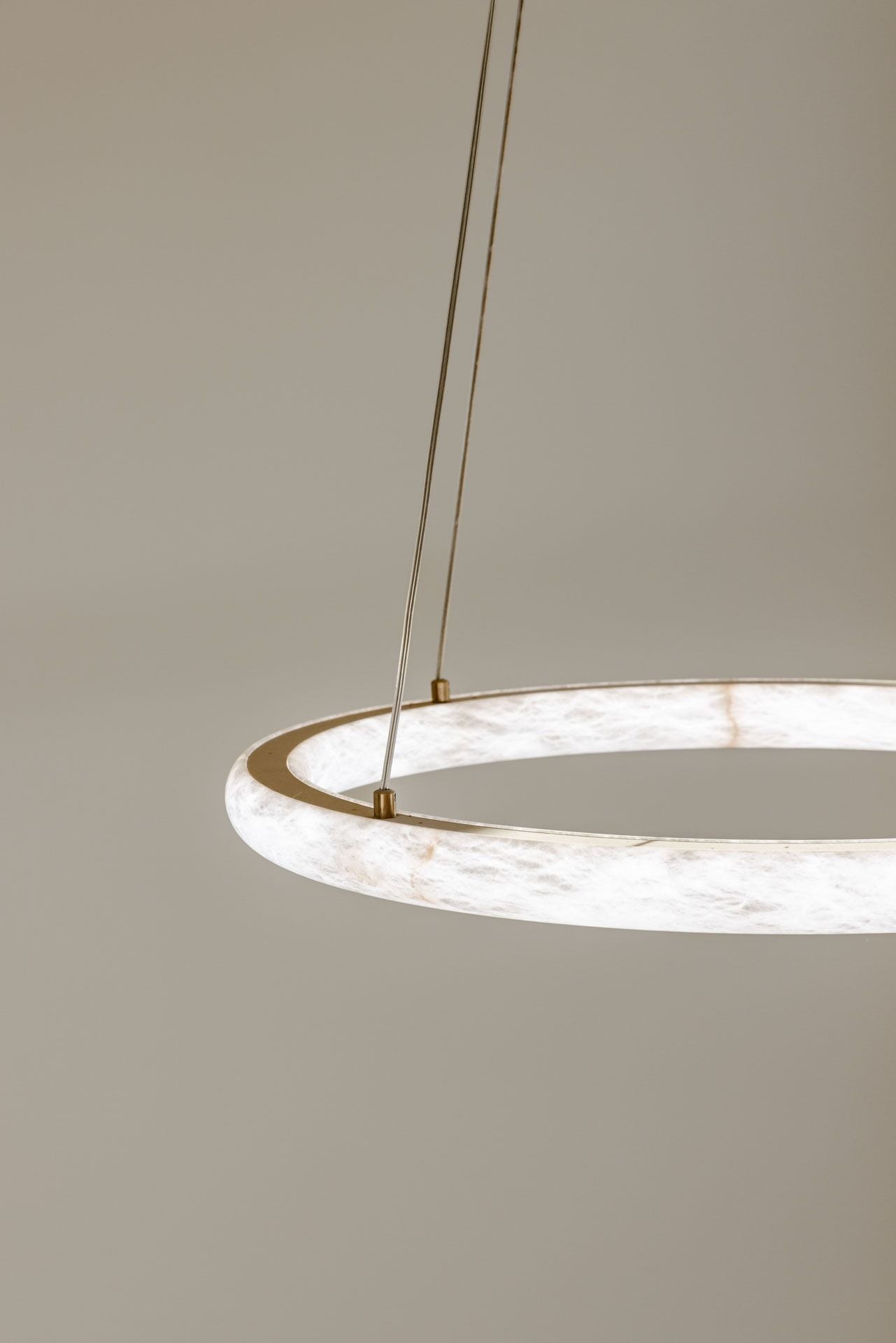 Modern Circular White Pendant Light Hanging from Two Thin Cords — Complete Property Projects In Phillip, ACT