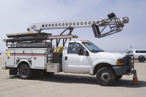 Utility Truck in Parking Lot — Jacksonville, FL — Paul Murray Oil Inc Utility Truck in Parking Lot — Jacksonville, FL — Paul Murray Oil Inc
