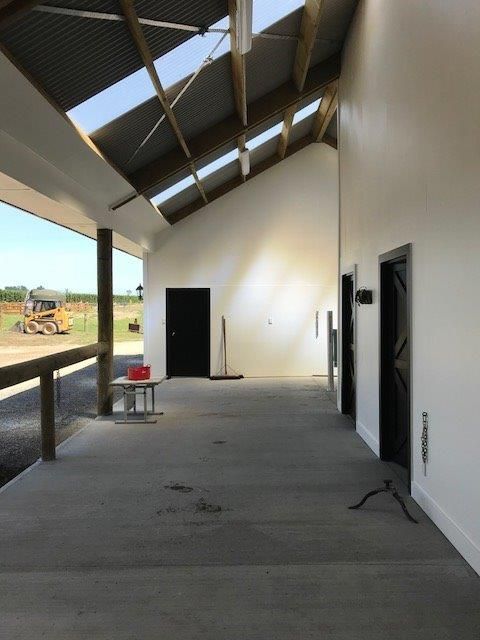 The inside of a building with a roof that has a skylight