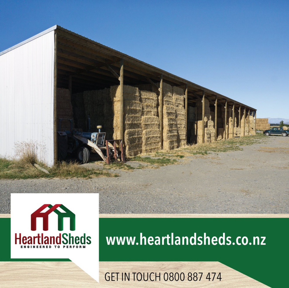 An advertisement for heartlandsheds with a picture of a barn