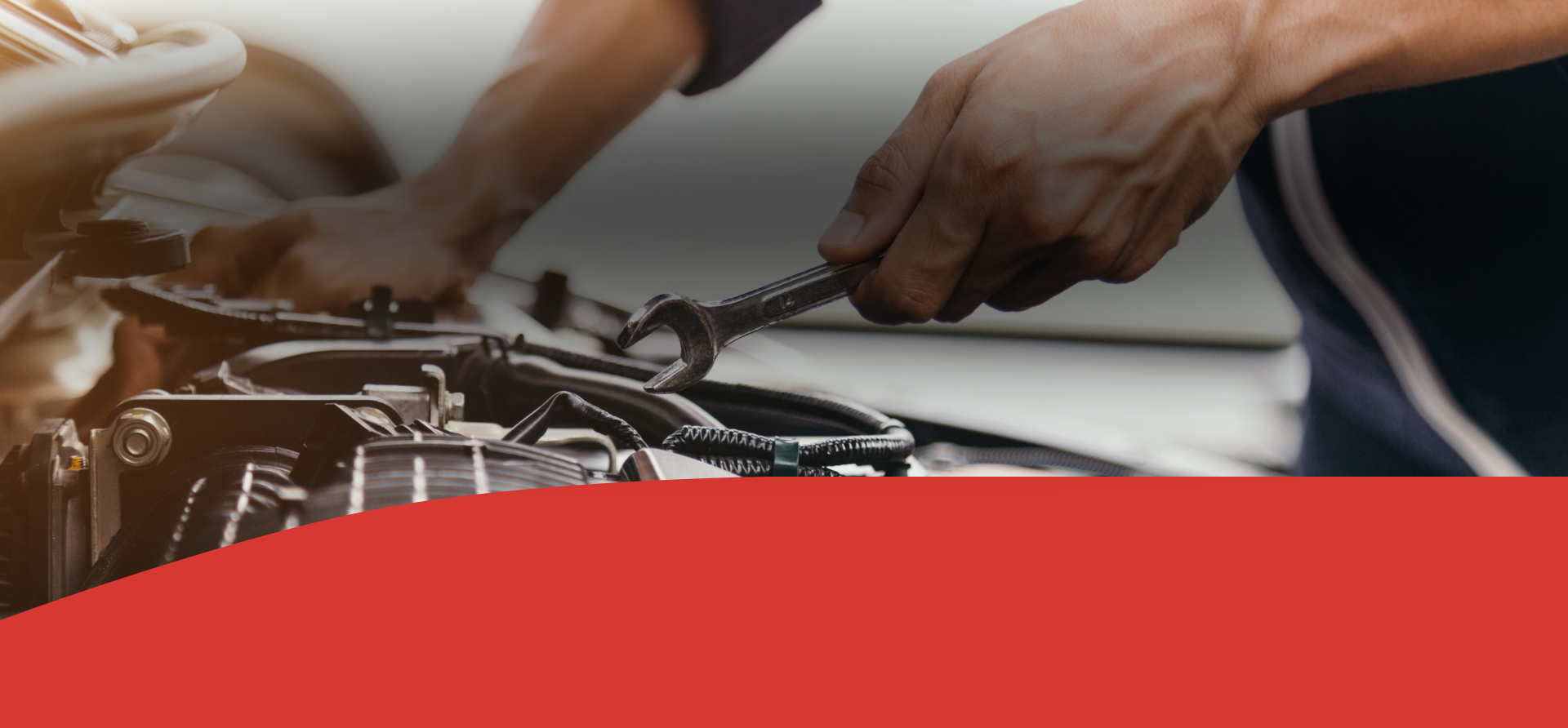 Hands using tools to repair a bicycle engine or mechanical assembly, with a red banner overlay