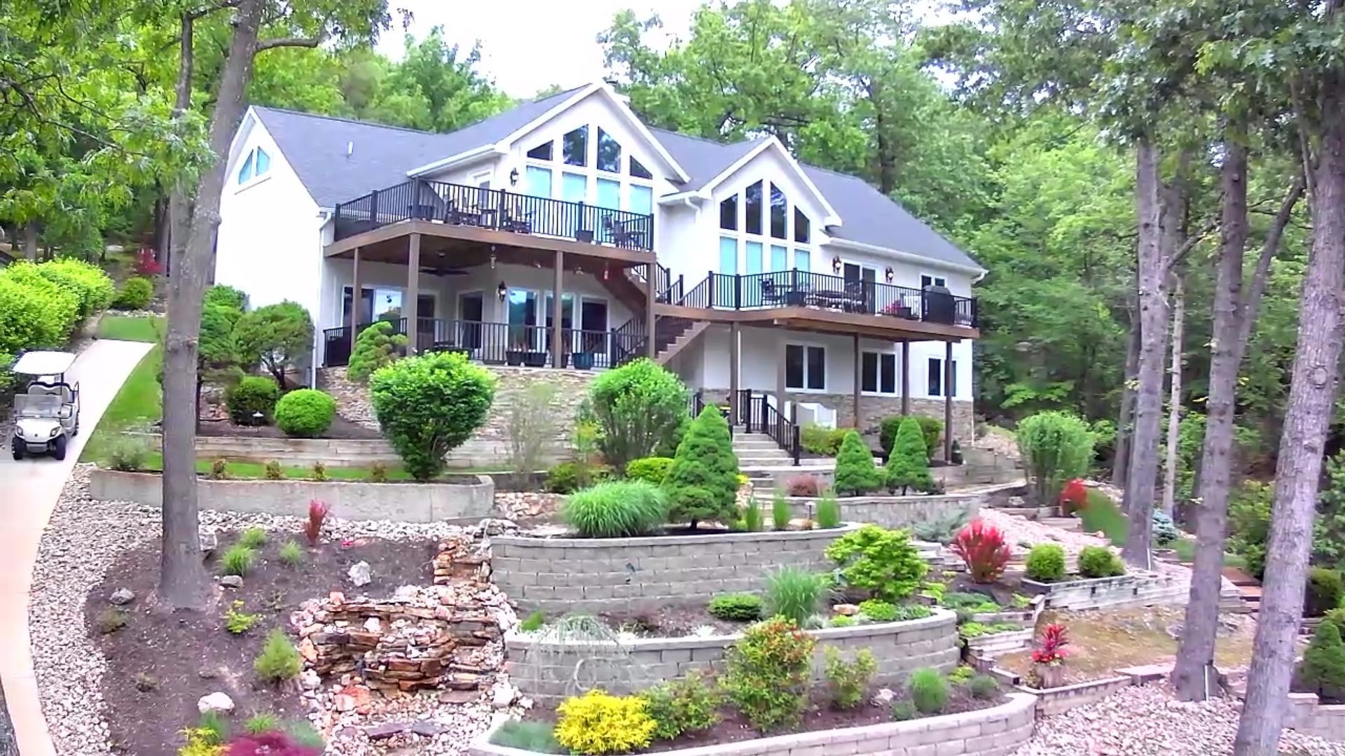 Large White House With Blue Trim From Watts Construction Near Lake Ozark, MO