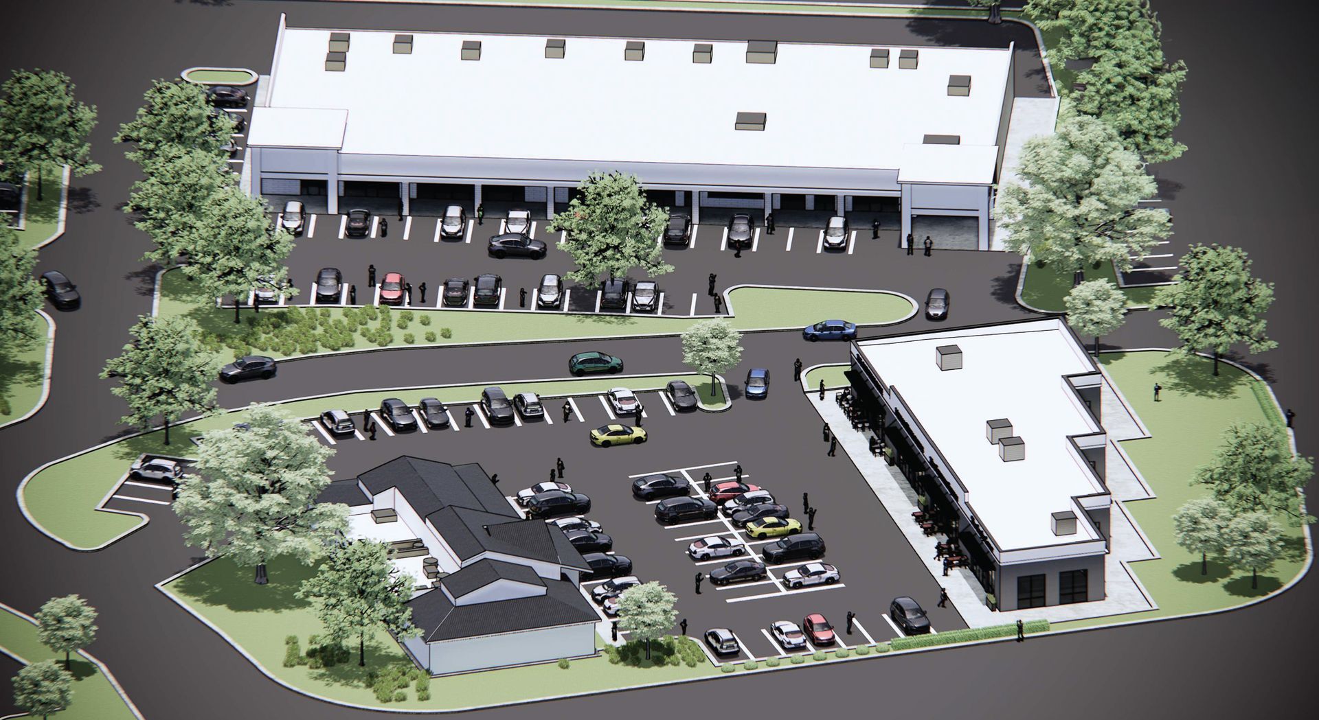 Aerial view of a car dealership, white buildings, parking lots with cars, trees.
