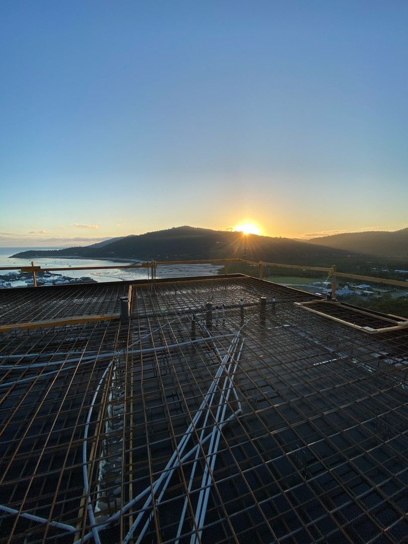 A Man Organising Cable On A New Residential Site — Kilowatts & Cool Whitsundays In Strathdickie, QLD