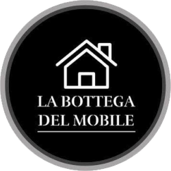 Logo circolare tenue con la scritta “il Prato agriturismo” in grigio chiaro su sfondo bianco.