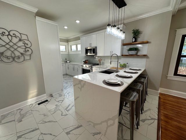 Kitchen Remodel by Makeover Construction LLC project photo 2