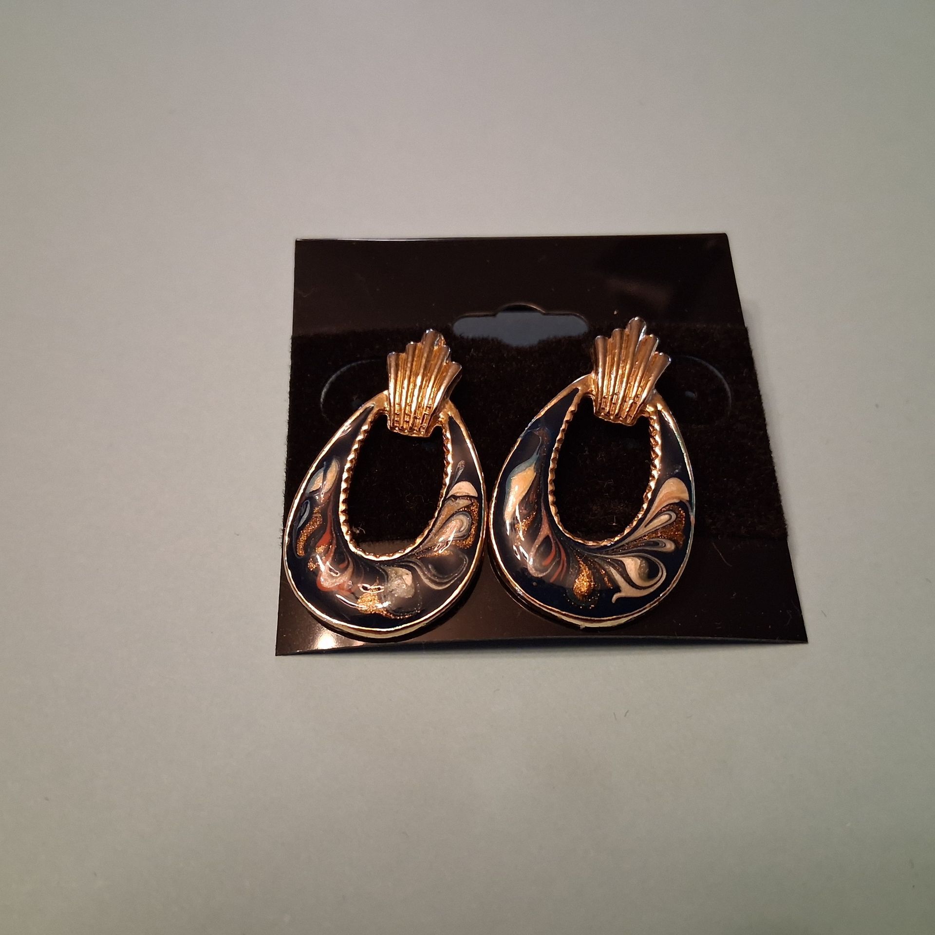 Three pairs of colorful earrings