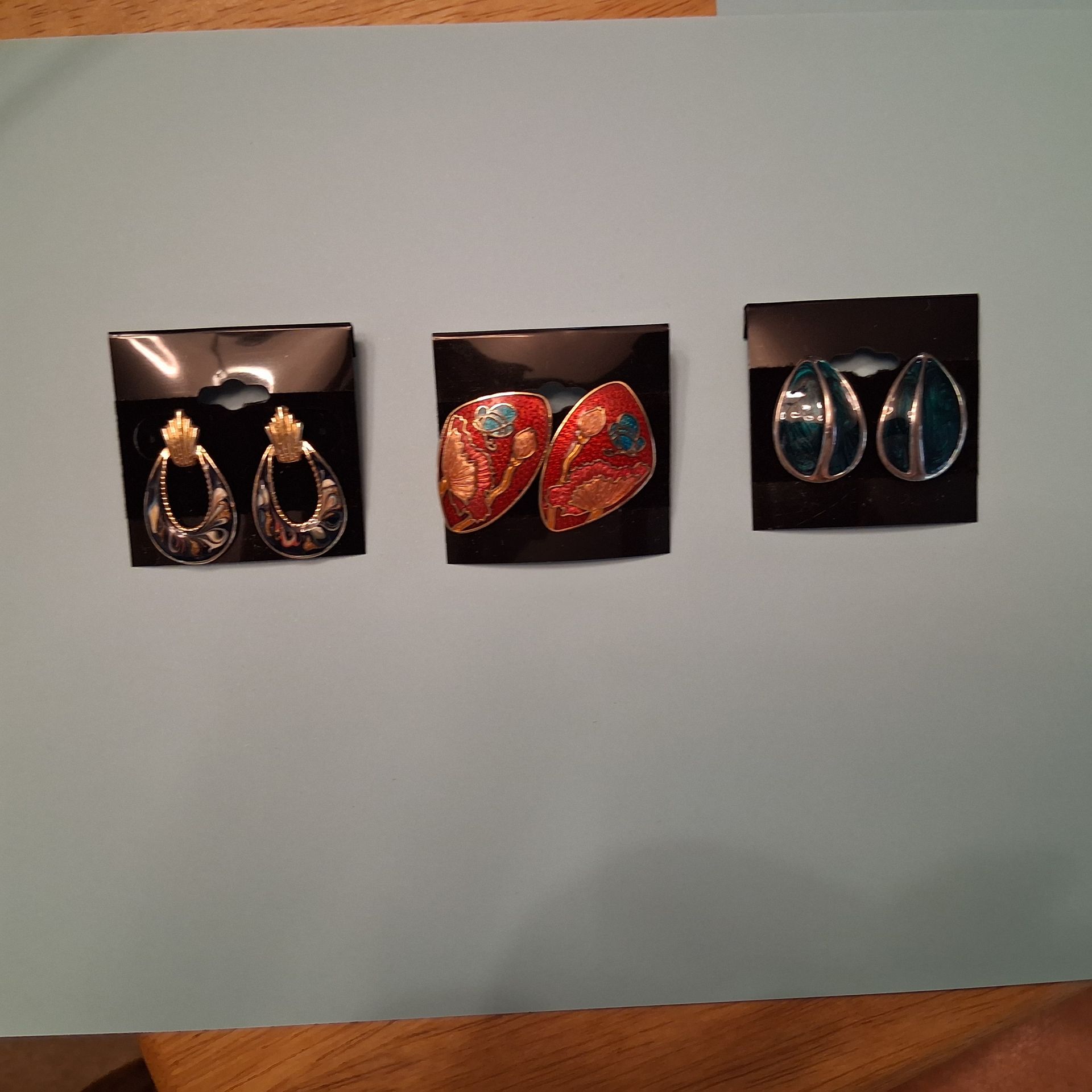 Three pairs of colorful earrings