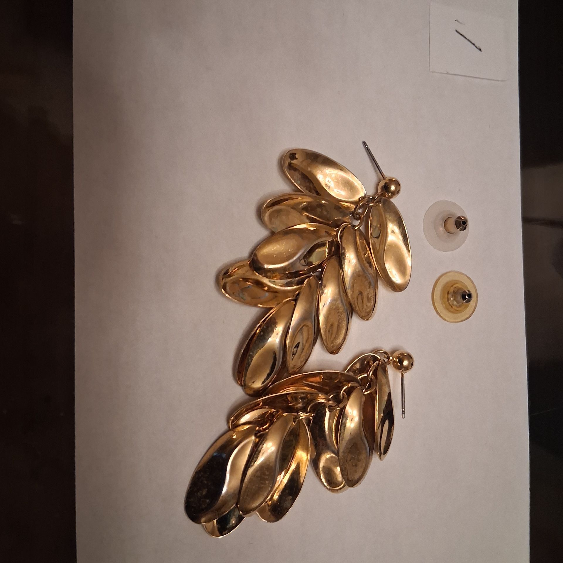 post gold tone earrings cascading leaves