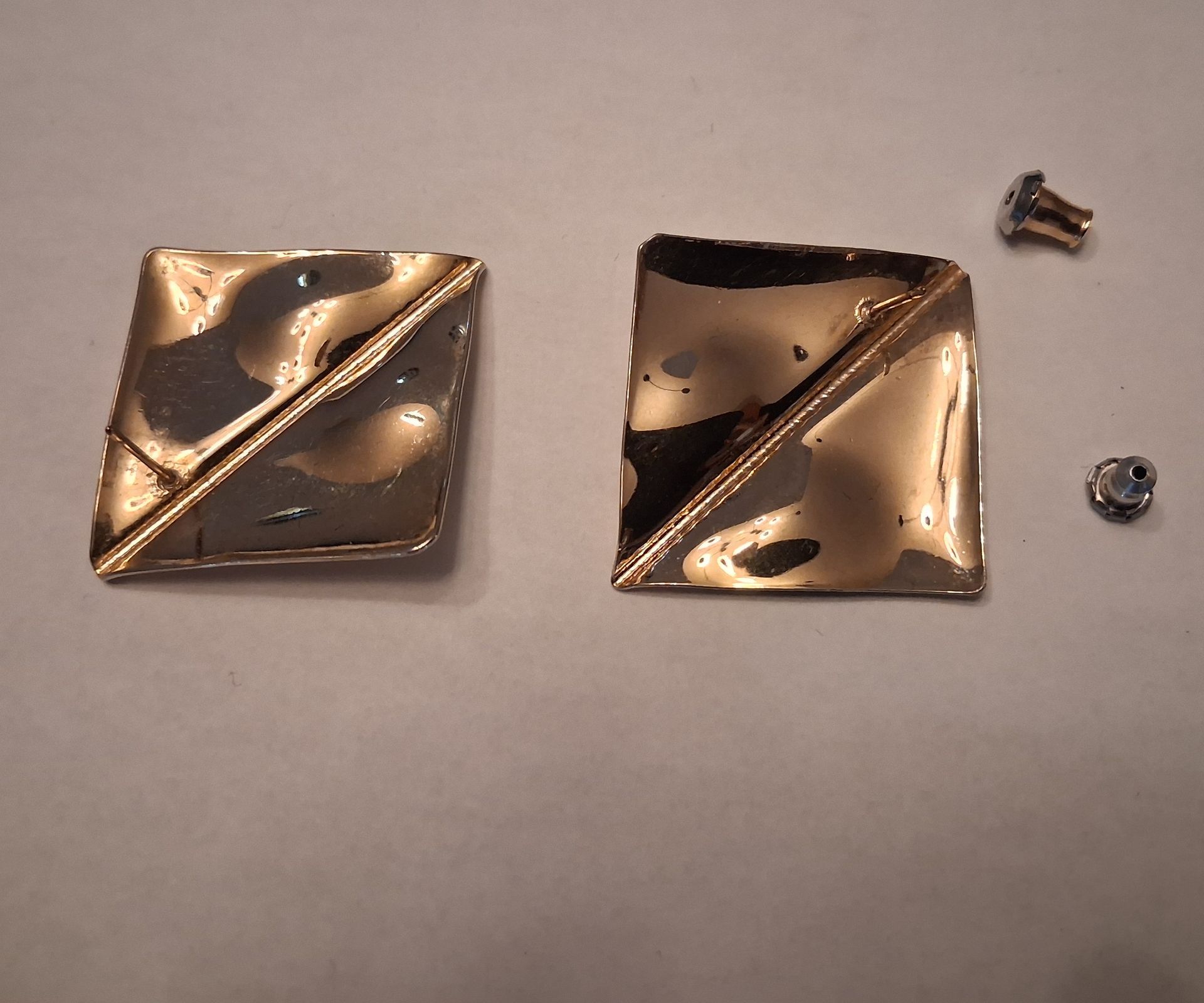 gold toned diagonal post earrings